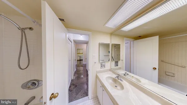 a view of a hallway with a window