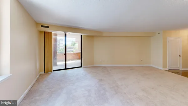 a view of a room and window