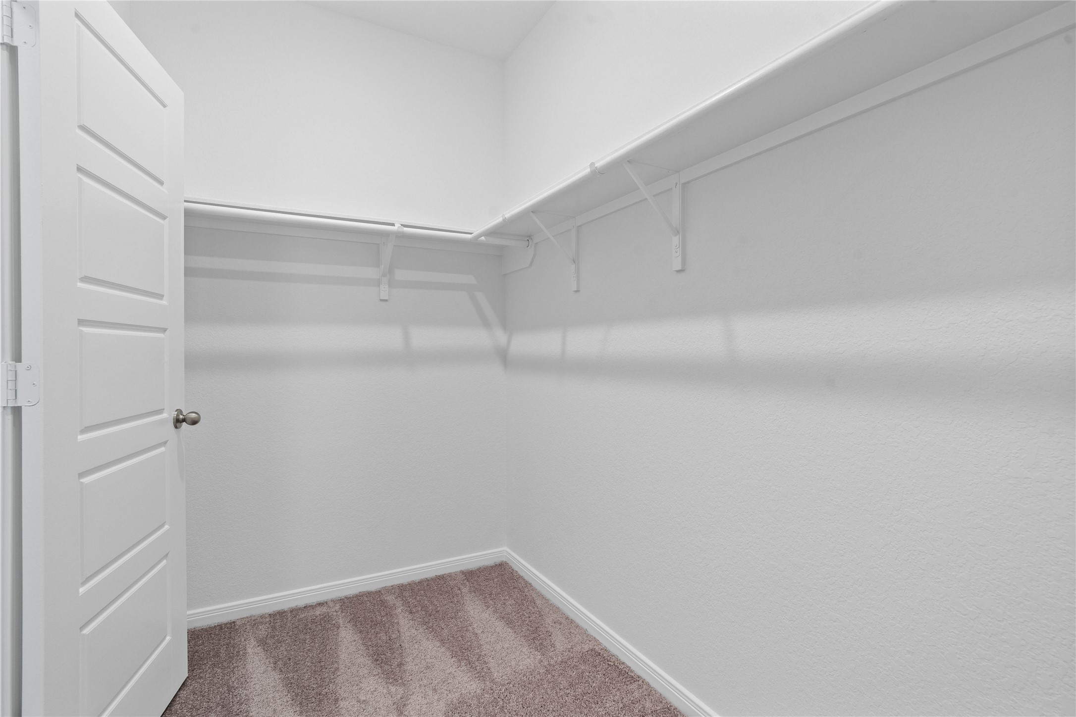 745 Imperial Loop Alvin, TX 77511 - Photo 14 of 29 a view of an empty walk in closet