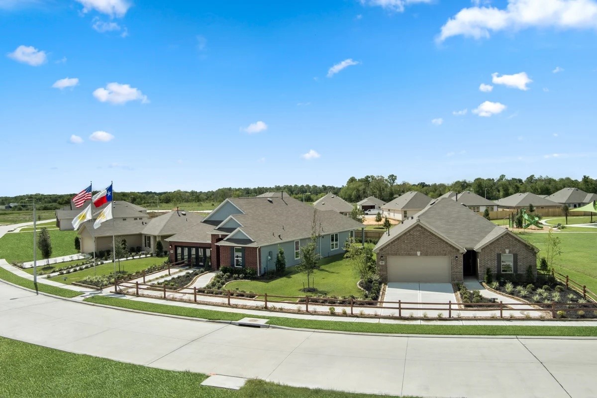 745 Imperial Loop Alvin, TX 77511 - Photo 26 of 29 a front view of a house with a yard