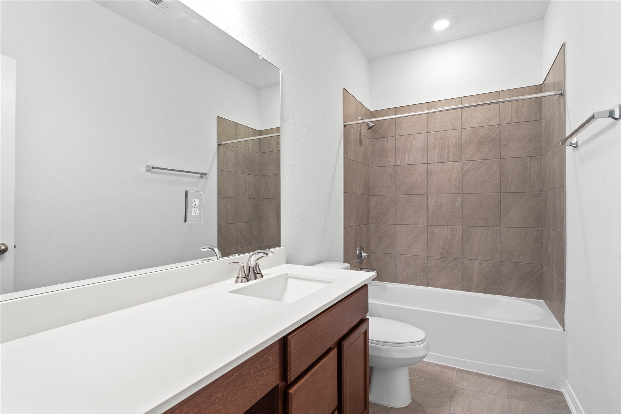 745 Imperial Loop Alvin, TX 77511 - Photo 7 of 29 a bathroom with a sink a toilet and shower