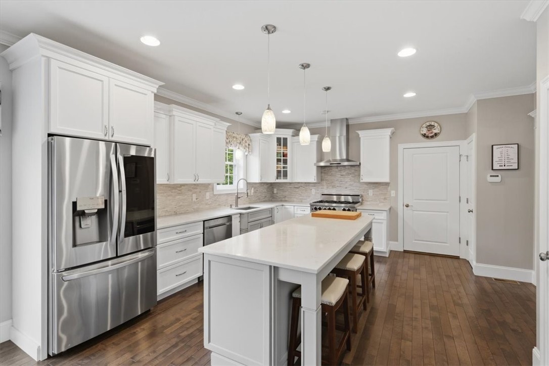 81 Cedar Forest Road Smithfield, RI 02917 - Photo 5 of 49 kitchen from living room view
