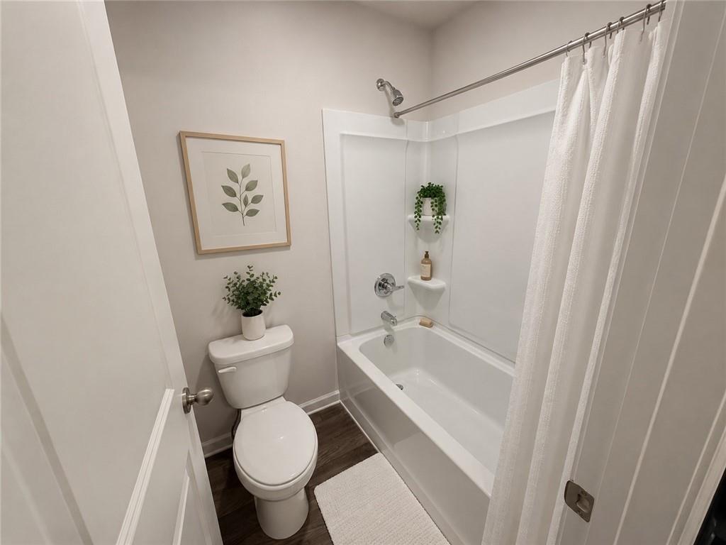 5151 Longview Run Decatur, GA 30035 - Photo 15 of 24 a white toilet sitting next to a bath tub