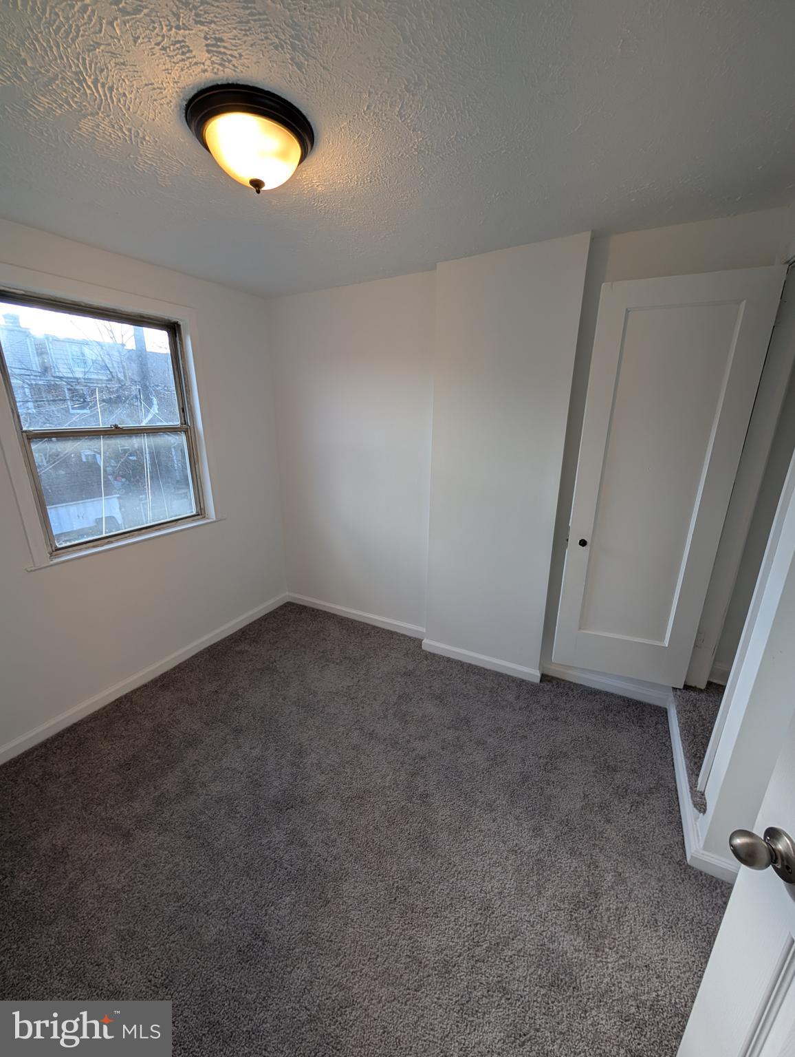 414 Avondale Road Dundalk, MD 21222 - Photo 12 of 29 an empty room with windows