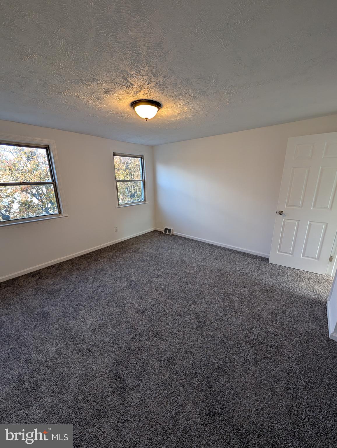 414 Avondale Road Dundalk, MD 21222 - Photo 13 of 29 an empty room with windows