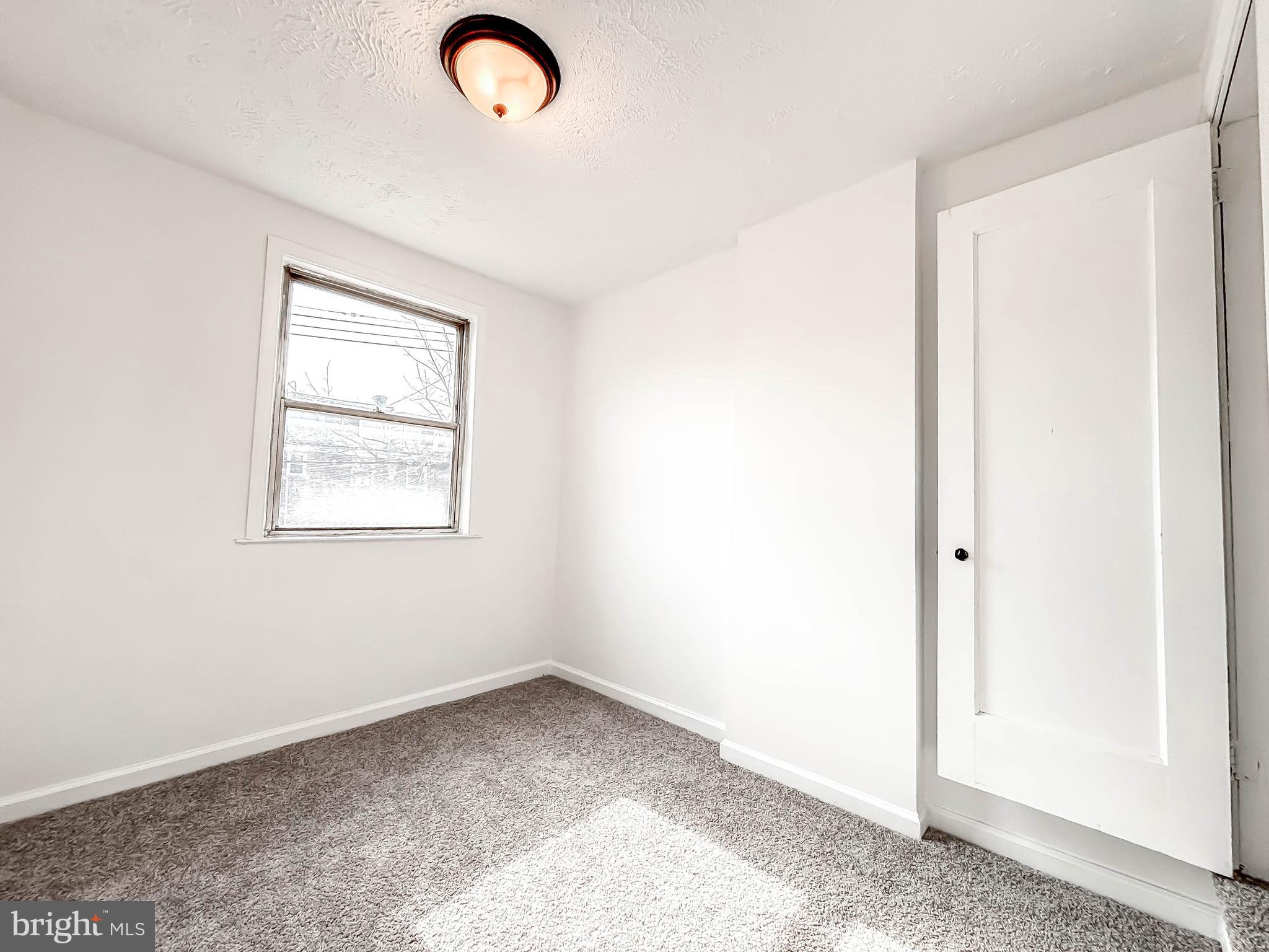 414 Avondale Road Dundalk, MD 21222 - Photo 21 of 33 an empty room with windows