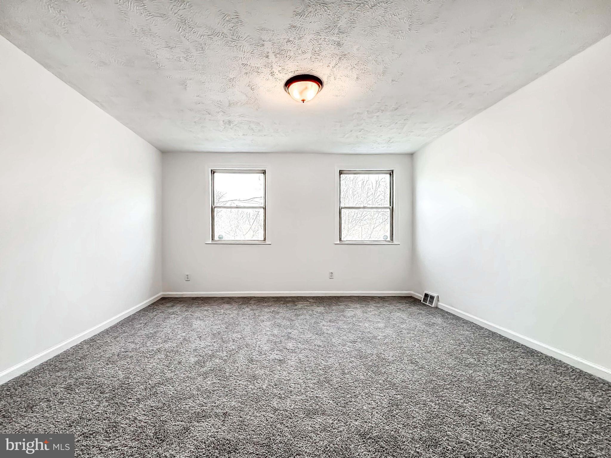 414 Avondale Road Dundalk, MD 21222 - Photo 24 of 33 an empty room with windows
