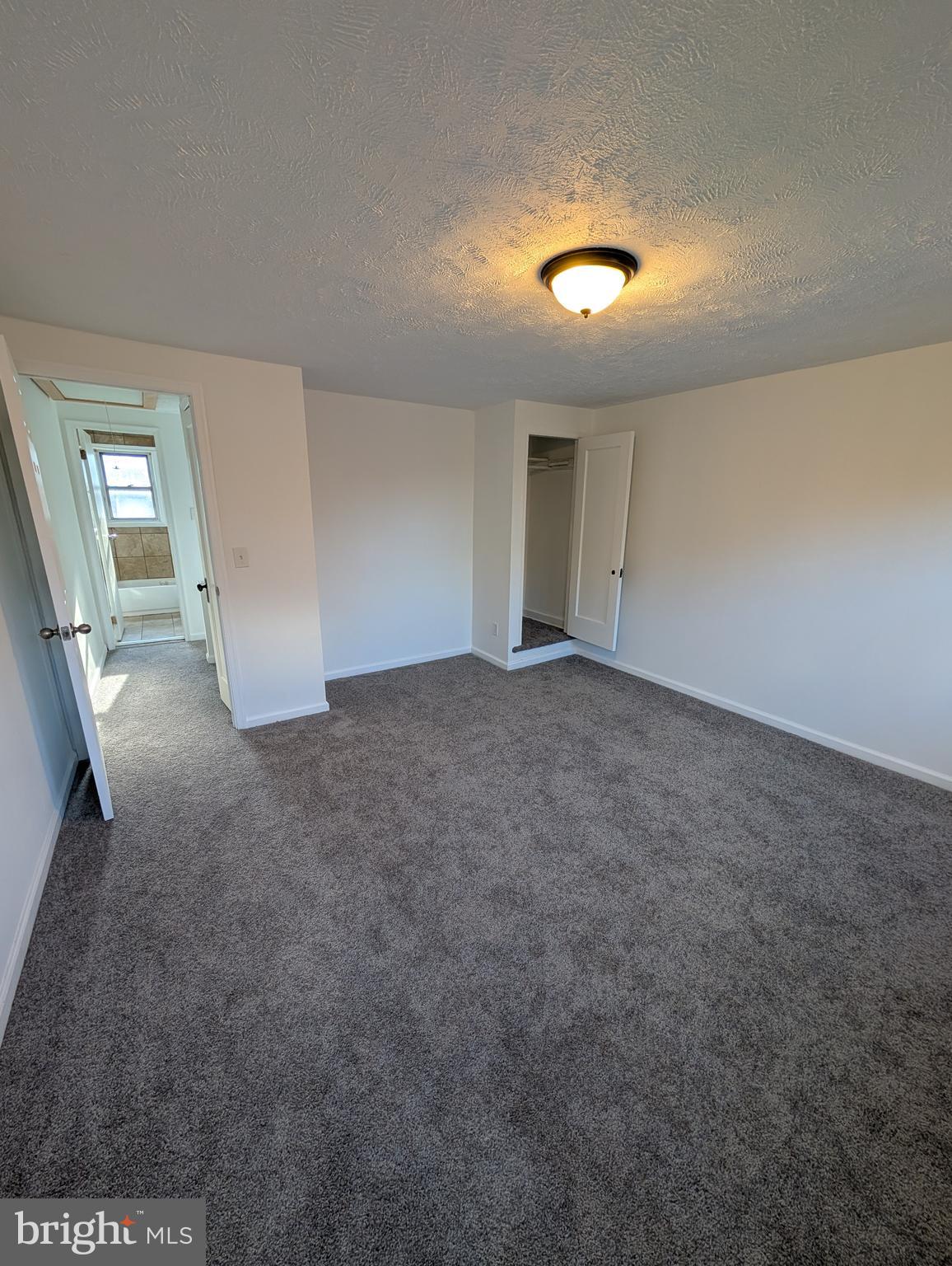 414 Avondale Road Dundalk, MD 21222 - Photo 25 of 29 an empty room with a empty space and windows