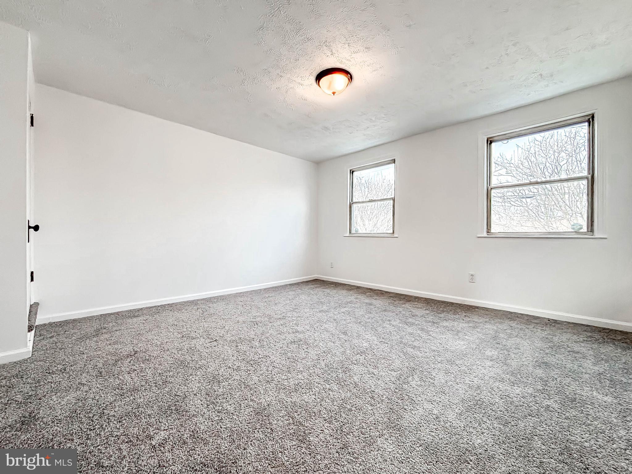414 Avondale Road Dundalk, MD 21222 - Photo 26 of 33 an empty room with windows