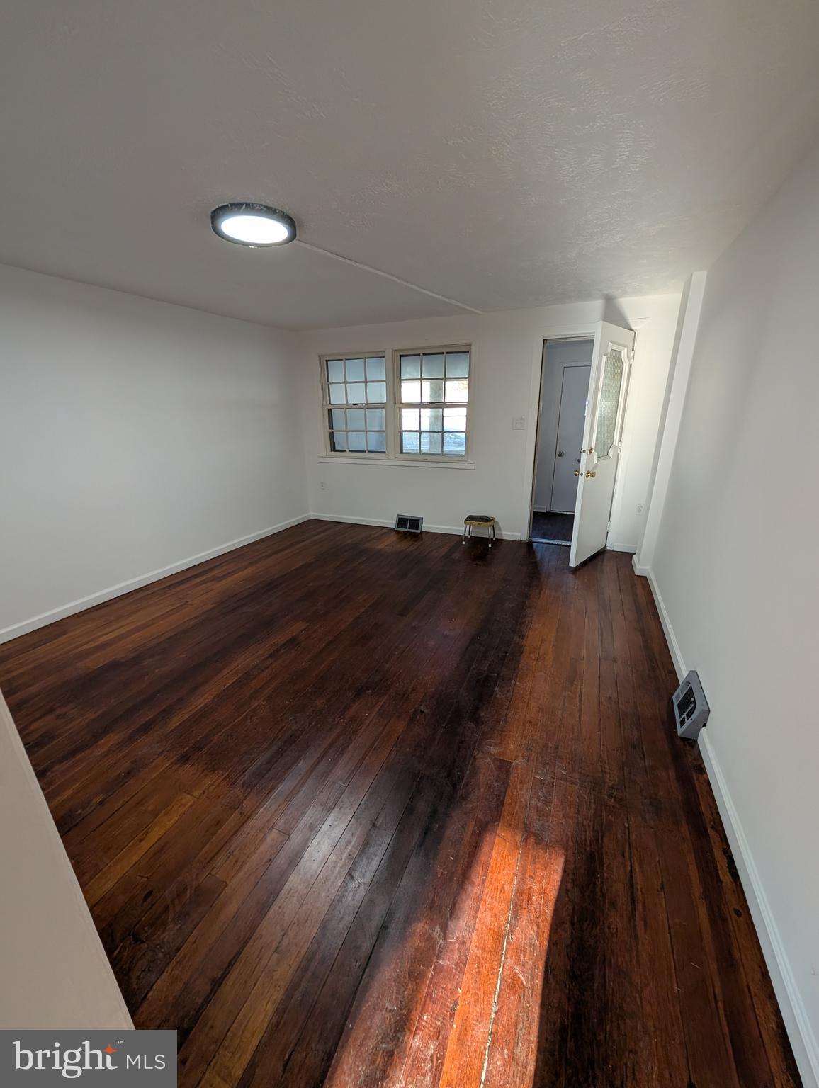 414 Avondale Road Dundalk, MD 21222 - Photo 4 of 29 a view of entryway with wooden floor