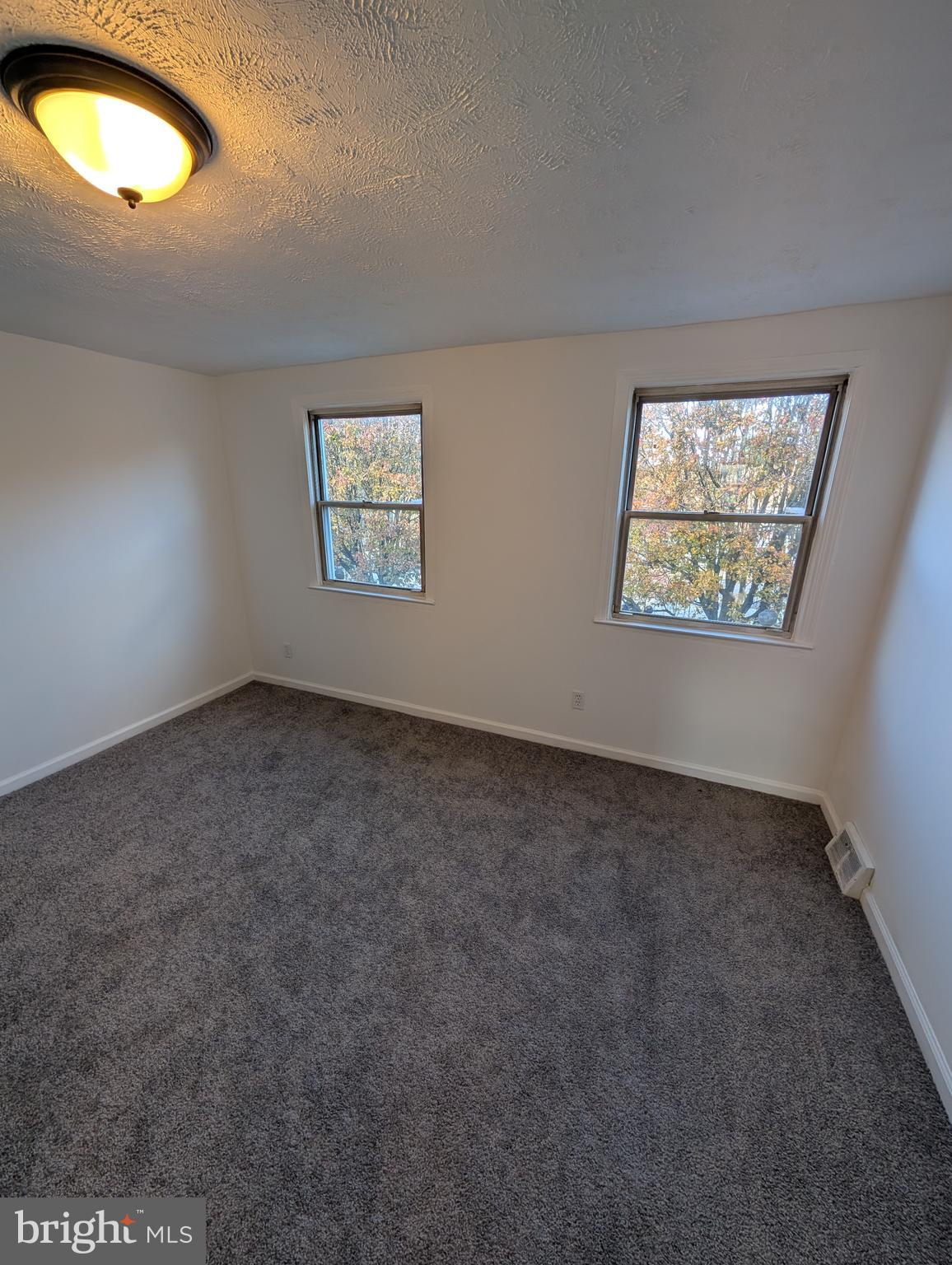 414 Avondale Road Dundalk, MD 21222 - Photo 5 of 29 an empty room with a window