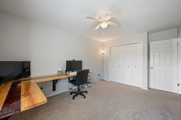 a view of workspace with lounge chair