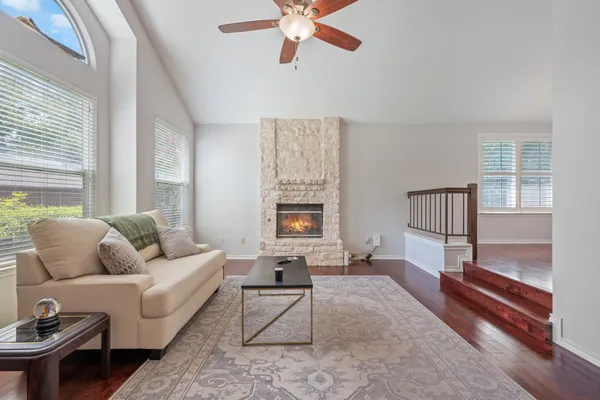 a living room with furniture and a window