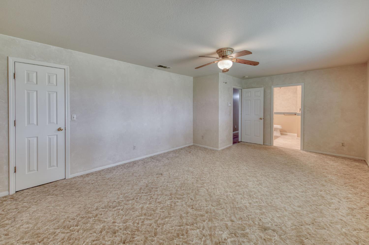 16036 South Del Rey Avenue Kingsburg, CA 93631 - Photo 33 of 64 a view of an empty room with a window