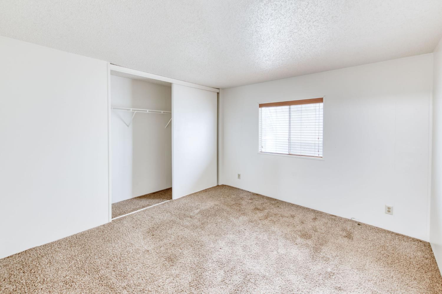 16036 South Del Rey Avenue Kingsburg, CA 93631 - Photo 52 of 64 an empty room with windows