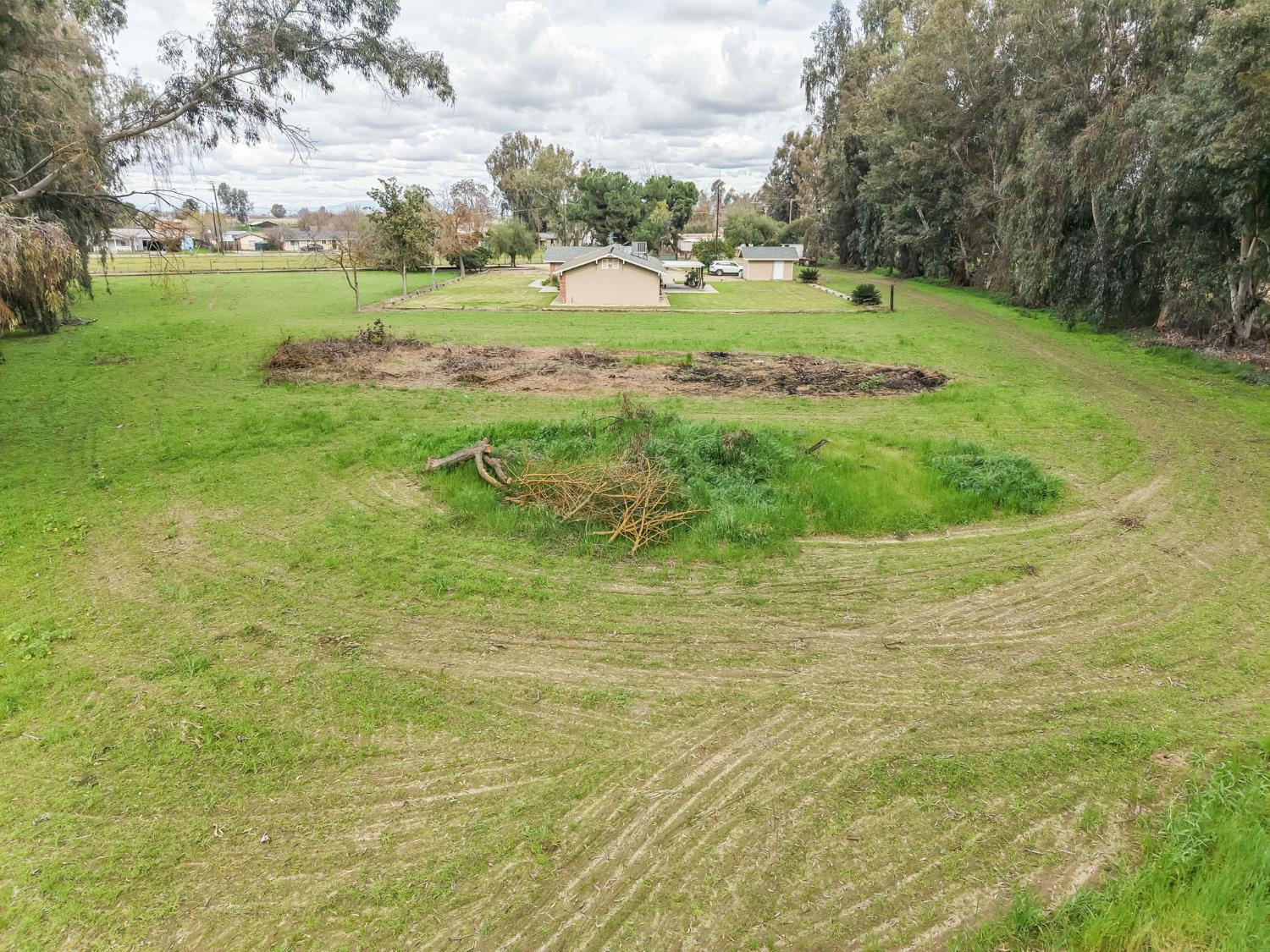 16036 South Del Rey Avenue Kingsburg, CA 93631 - Photo 58 of 64 a view of building with outdoor space