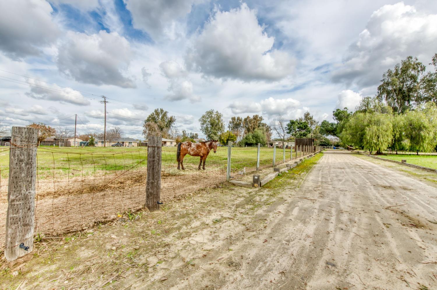 16036 South Del Rey Avenue Kingsburg, CA 93631 - Photo 6 of 64 a view of a park with swings and slides