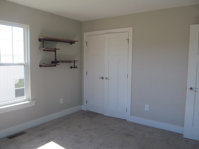 1158 Neal Road Watertown, TN 37184 - Photo 11 of 15 an empty room with a window