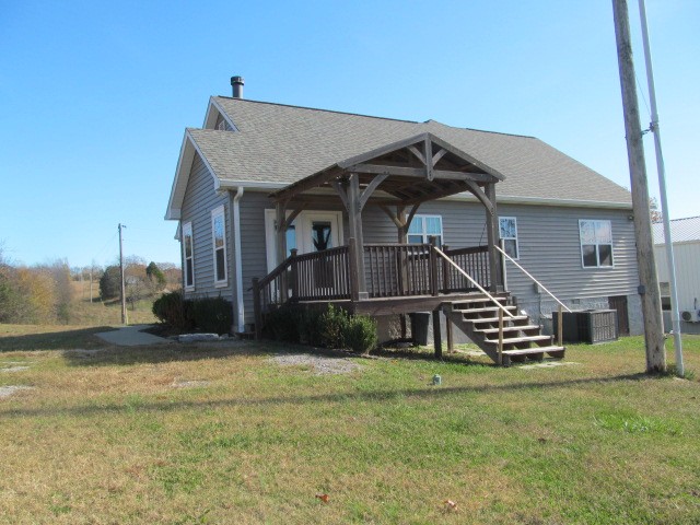 1158 Neal Road Watertown, TN 37184 - Photo 13 of 15 a view of a house with a yard