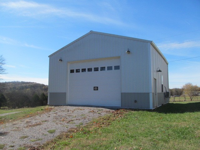 1158 Neal Road Watertown, TN 37184 - Photo 14 of 15 a view of a house with a yard