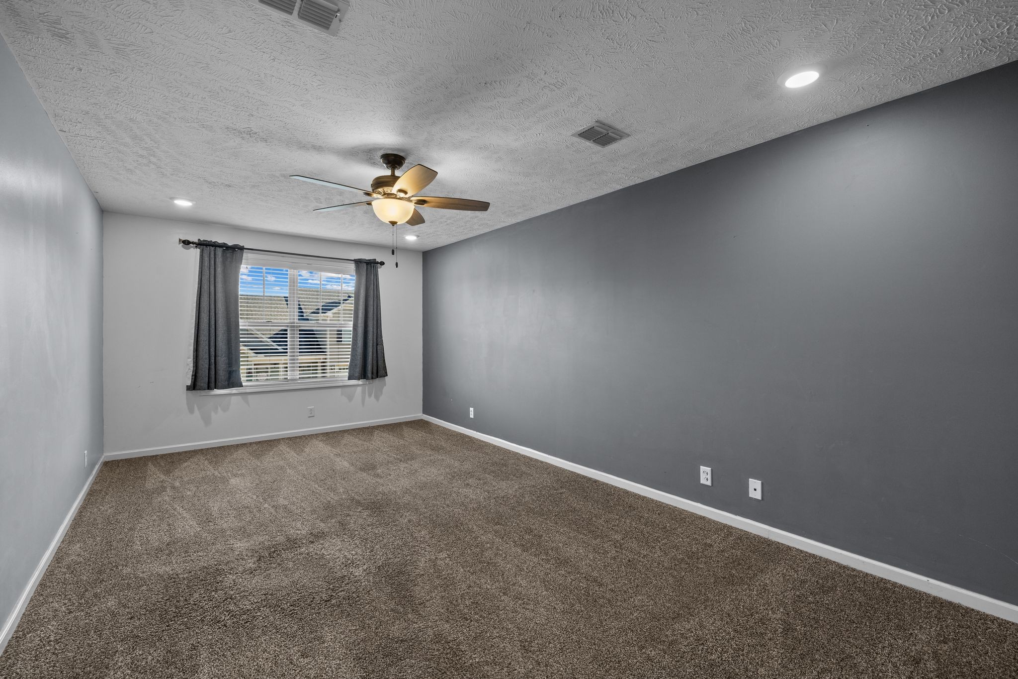 911 Keepsake Diamond Lane Murfreesboro, TN 37128 - Photo 17 of 33 wooden floor in an empty room with a window