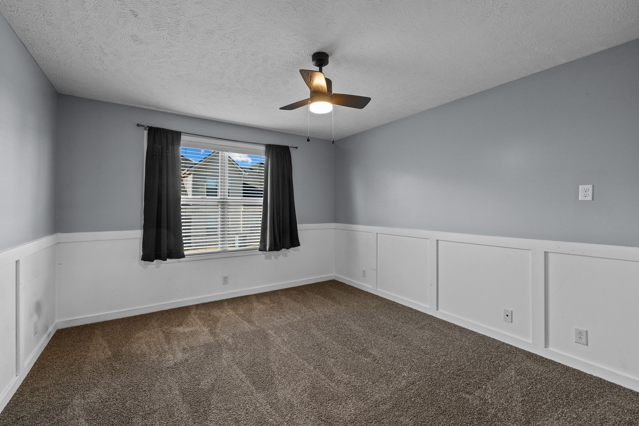 911 Keepsake Diamond Lane Murfreesboro, TN 37128 - Photo 24 of 33 wooden floor in an empty room with a window