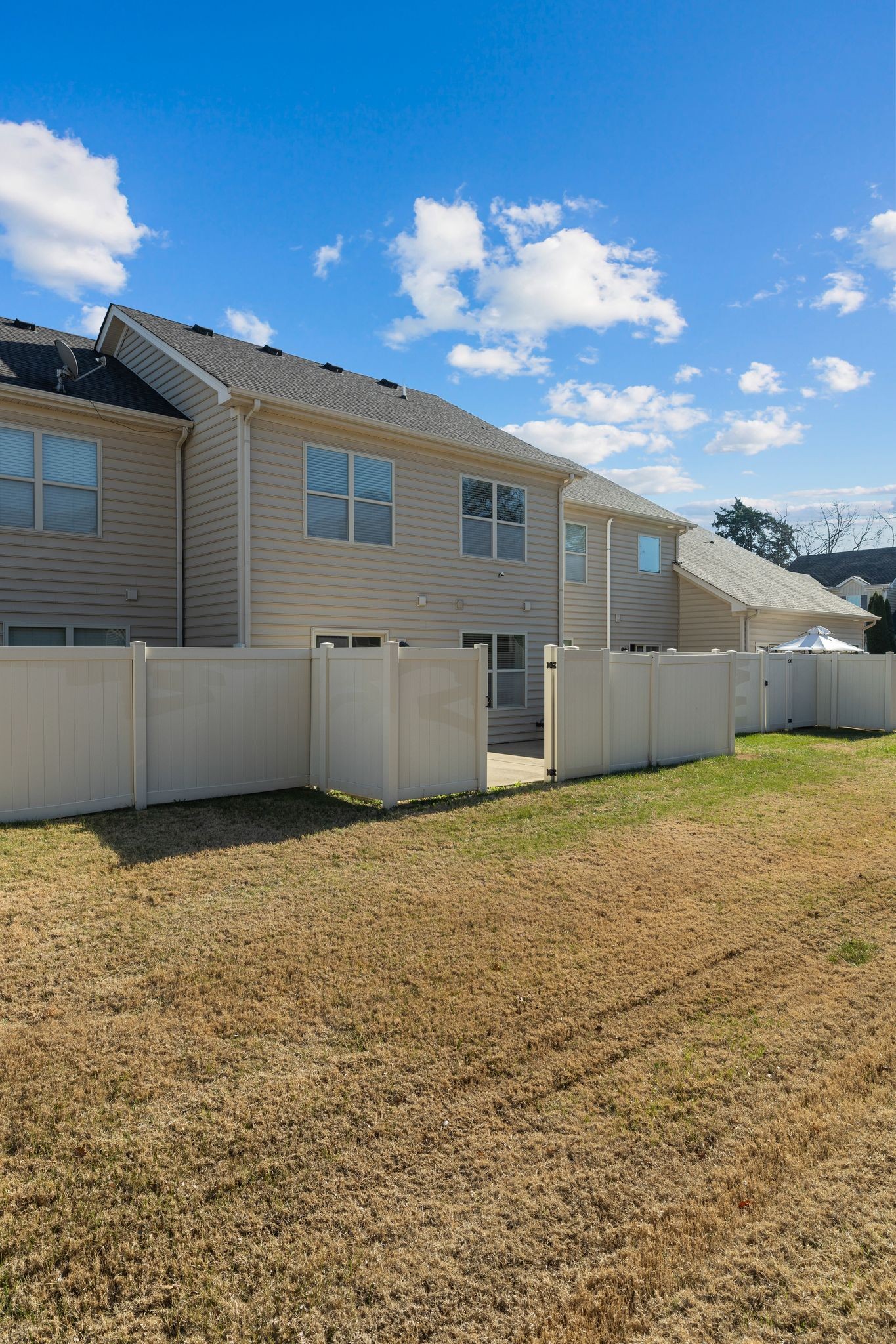 911 Keepsake Diamond Lane Murfreesboro, TN 37128 - Photo 27 of 33 a view of an empty room with kitchen