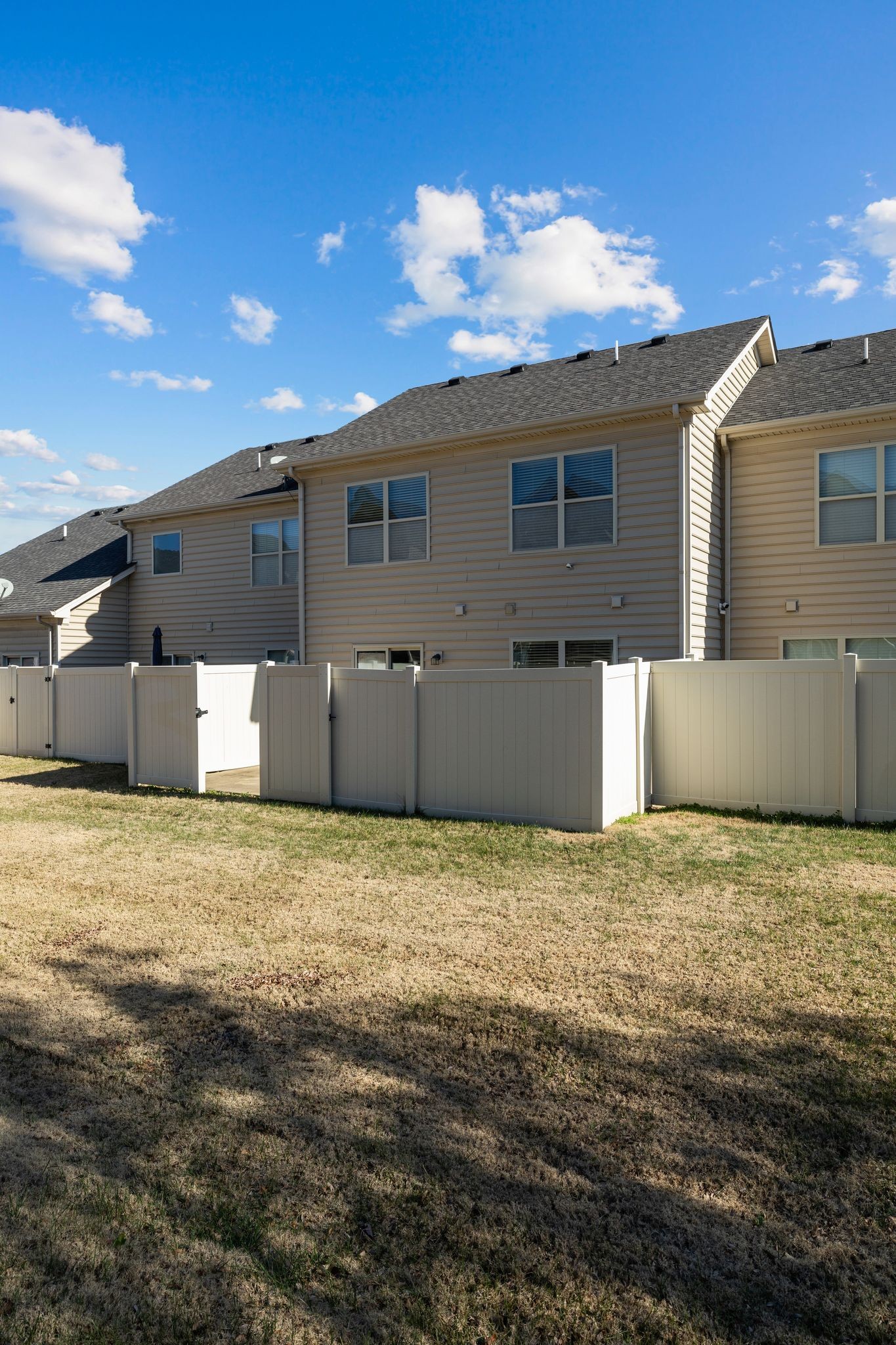 911 Keepsake Diamond Lane Murfreesboro, TN 37128 - Photo 28 of 33 a large house with a large tree
