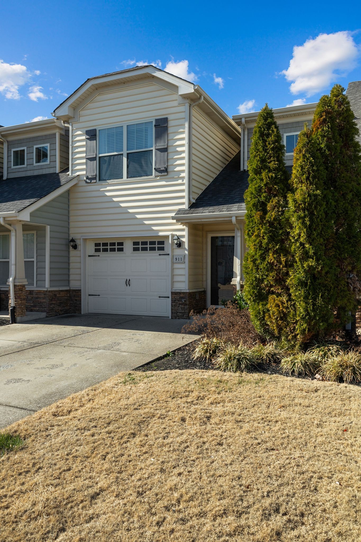 911 Keepsake Diamond Lane Murfreesboro, TN 37128 - Photo 30 of 33 a front view of a house with a yard