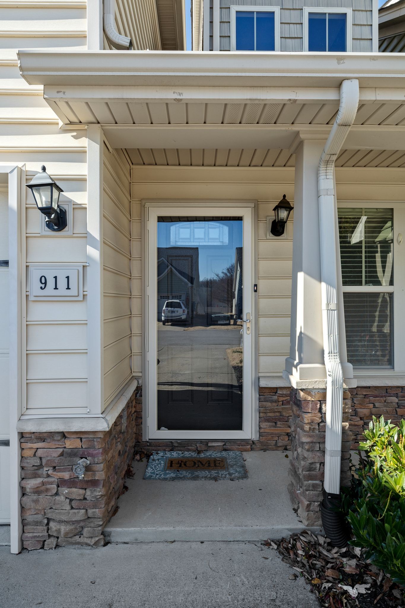 911 Keepsake Diamond Lane Murfreesboro, TN 37128 - Photo 31 of 33 a living room with a fireplace and a rug