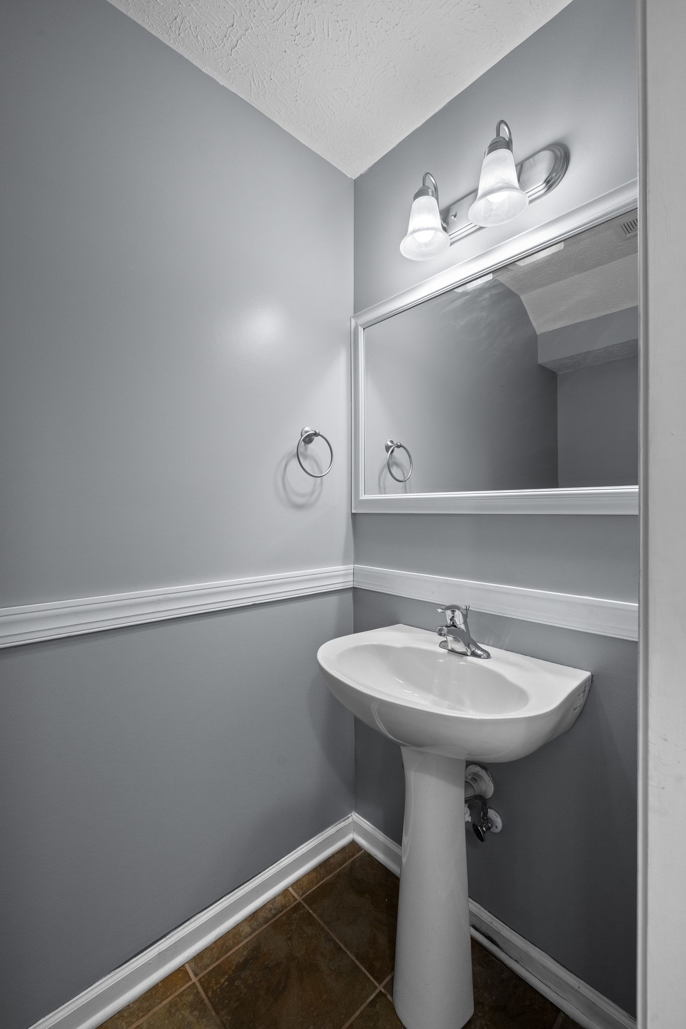 911 Keepsake Diamond Lane Murfreesboro, TN 37128 - Photo 8 of 33 a bathroom with a sink and a mirror