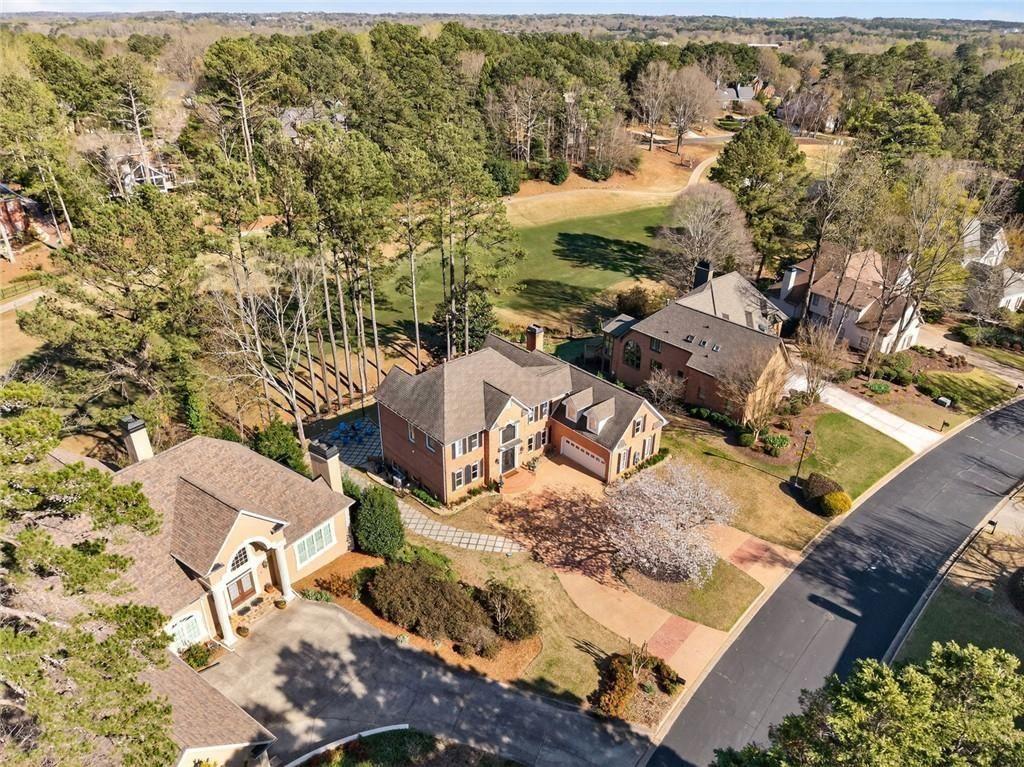 1026 Quaker Ridge Way Johns Creek, GA 30097 - Photo 71 of 80 an aerial view of multiple house