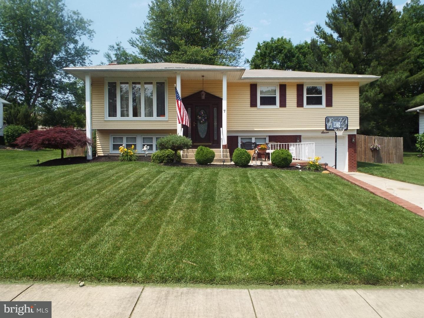 7 Ohio State Drive Riverside, NJ 08075 - Photo 1 of 25 a front view of a house with a yard
