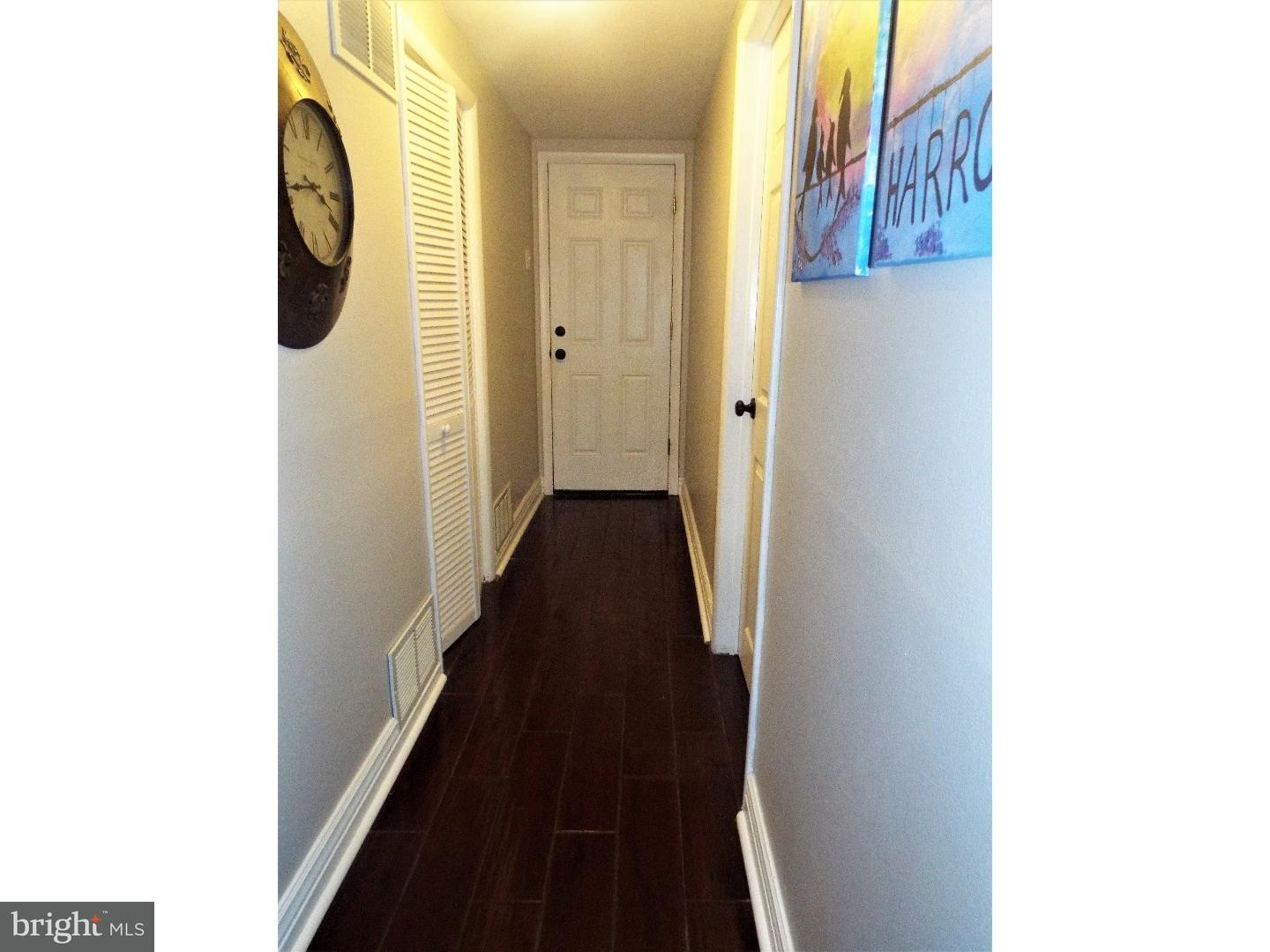 7 Ohio State Drive Riverside, NJ 08075 - Photo 21 of 25 a view of a hallway with painted walls