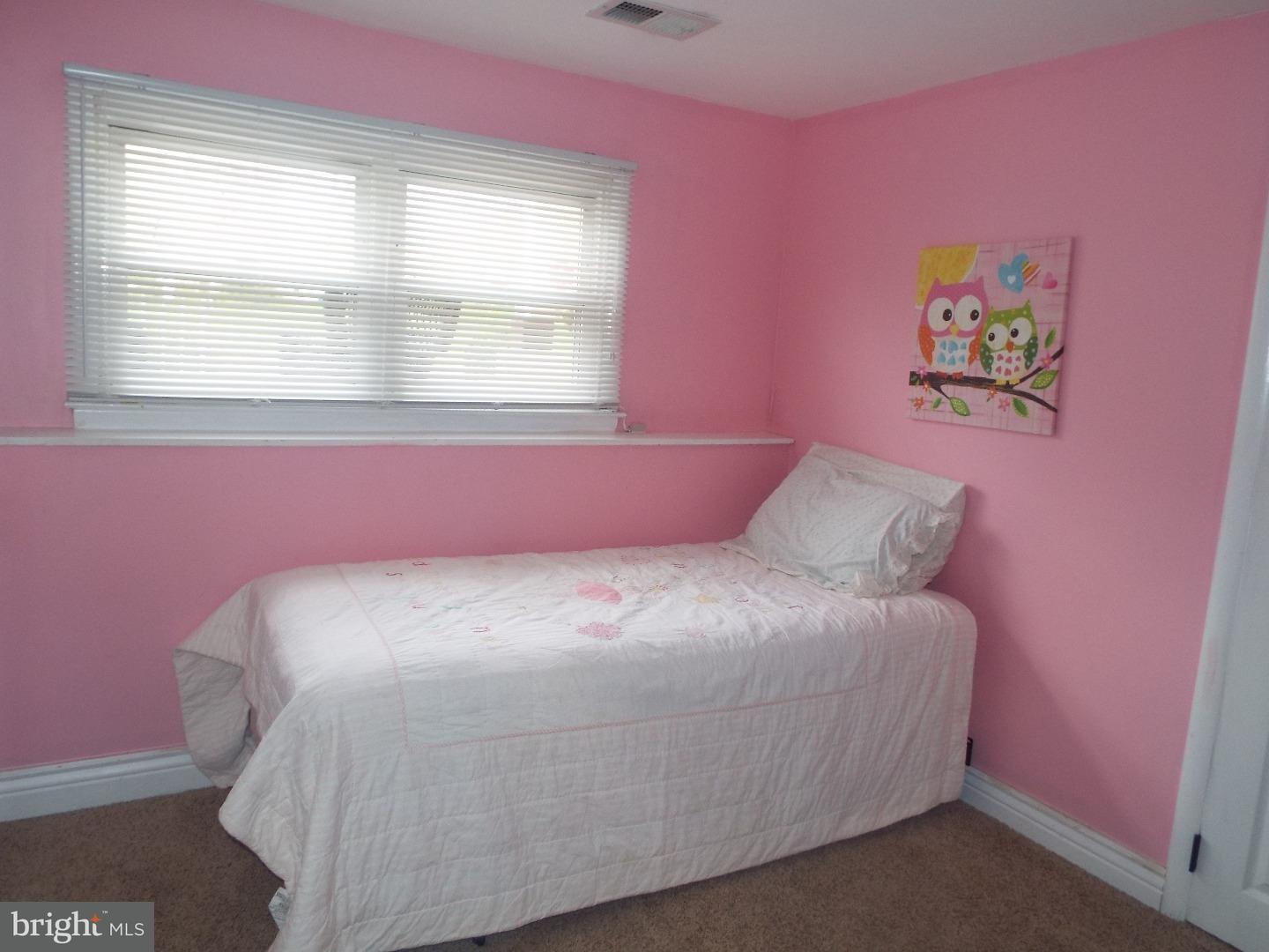 7 Ohio State Drive Riverside, NJ 08075 - Photo 23 of 25 a bed room with a bed and a window