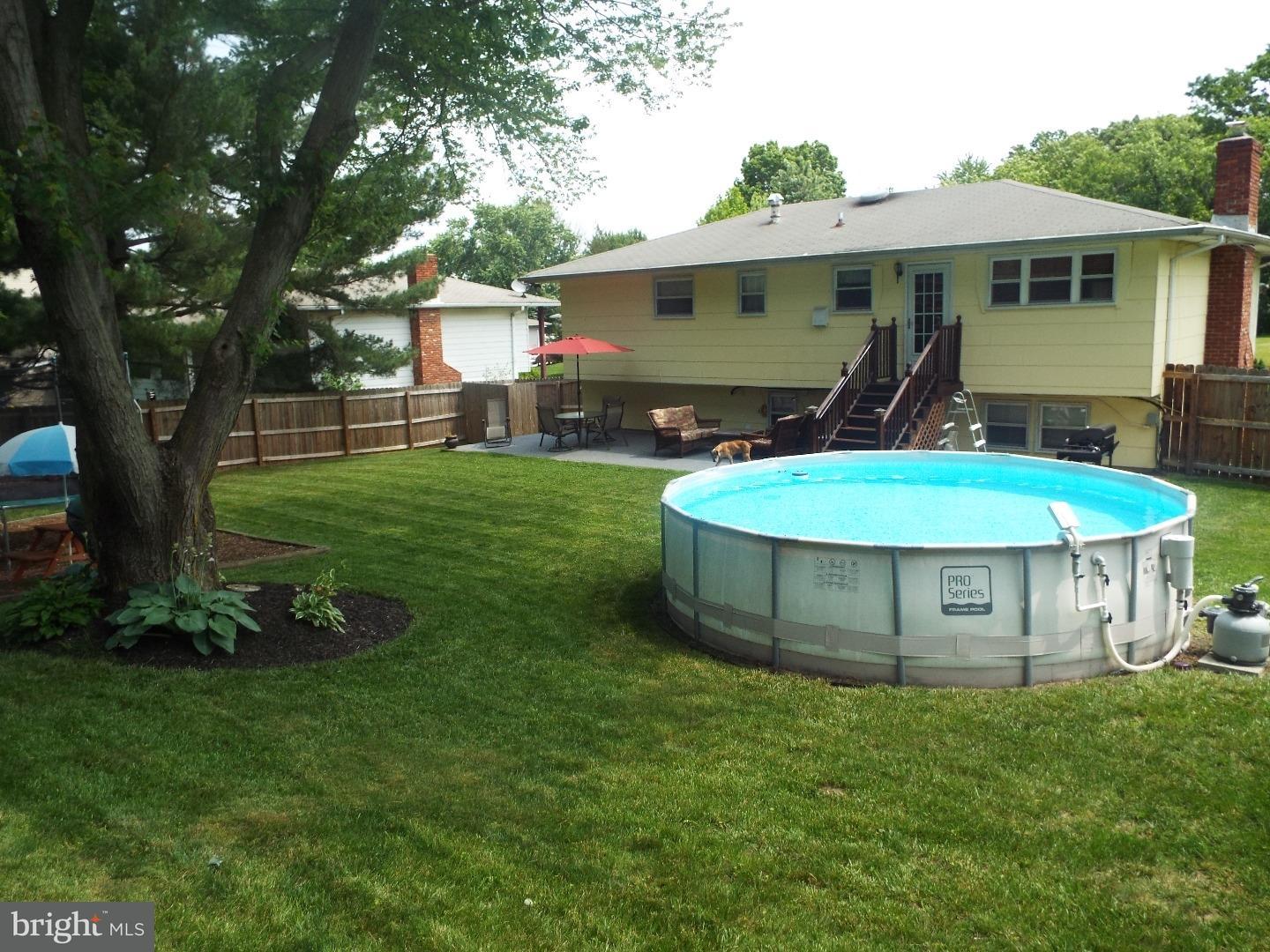 7 Ohio State Drive Riverside, NJ 08075 - Photo 4 of 25 a view of a house with a backyard and a patio