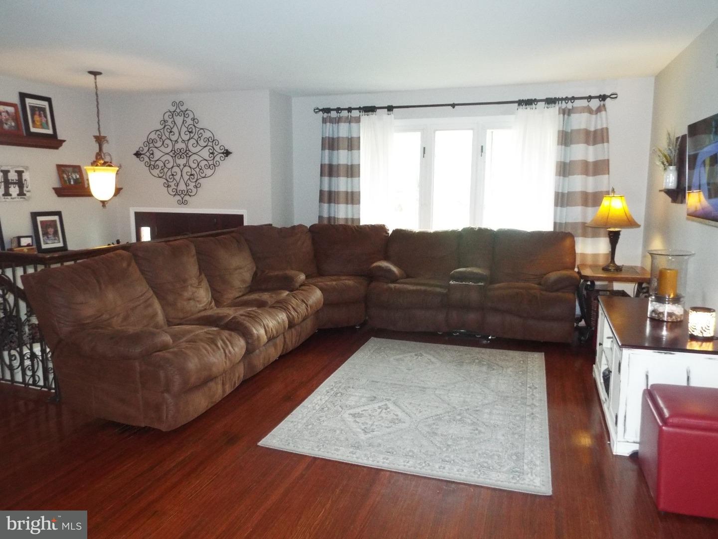 7 Ohio State Drive Riverside, NJ 08075 - Photo 9 of 25 a living room with furniture and a window