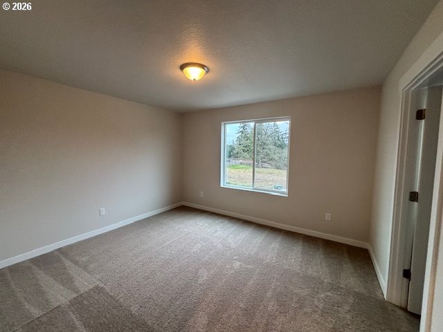 1585 Young Street Lafayette, OR 97127 - Photo 14 of 23 an empty room with windows