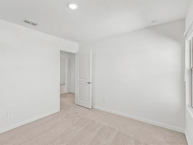 a bathroom with a sink double vanity and a mirror