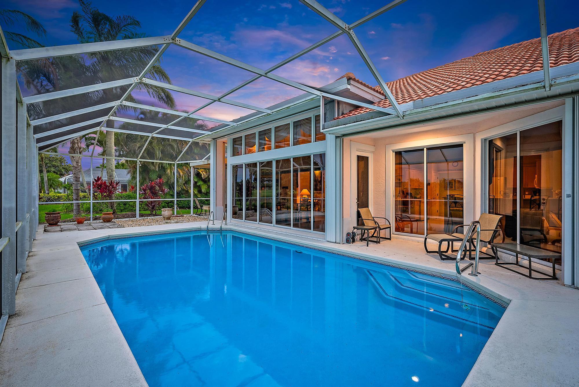 8157 Southeast Double Tree Drive Hobe Sound, FL 33455 - Photo 27 of 46 a view of swimming pool with outdoor seating