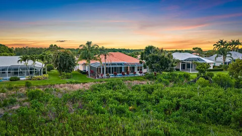 a view of a house with a big yard