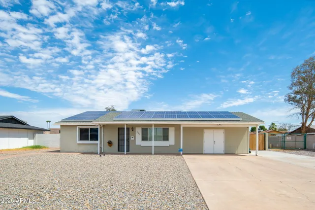 an aerial view of residential building with parking space