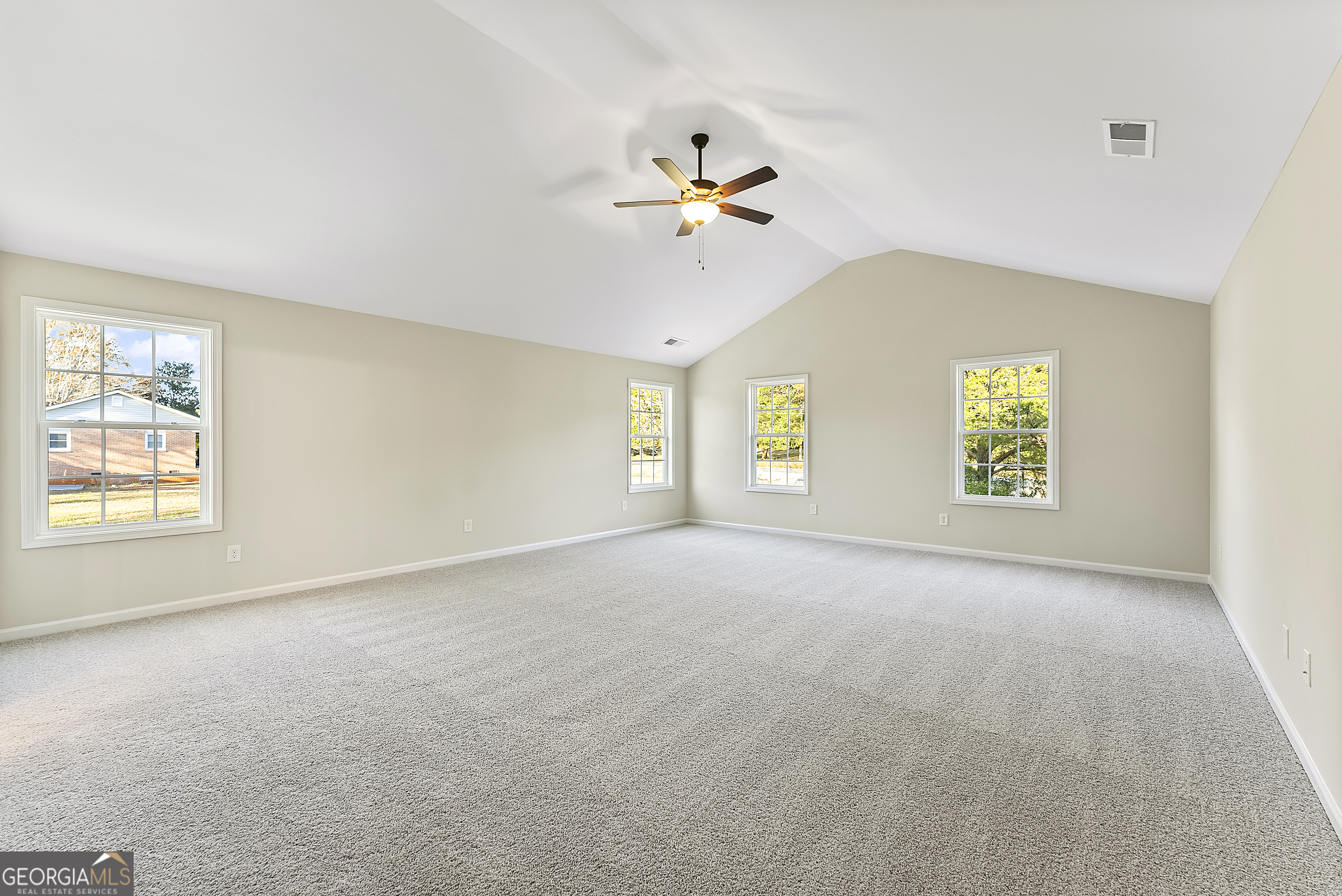 575 Mountain View Drive, Unit 17B Hamilton, GA 31811 - Photo 13 of 34 a view of an empty room with a window