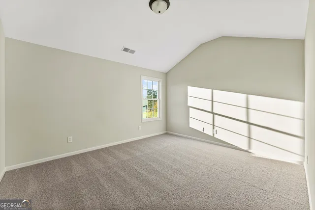 a view of livingroom with an empty space