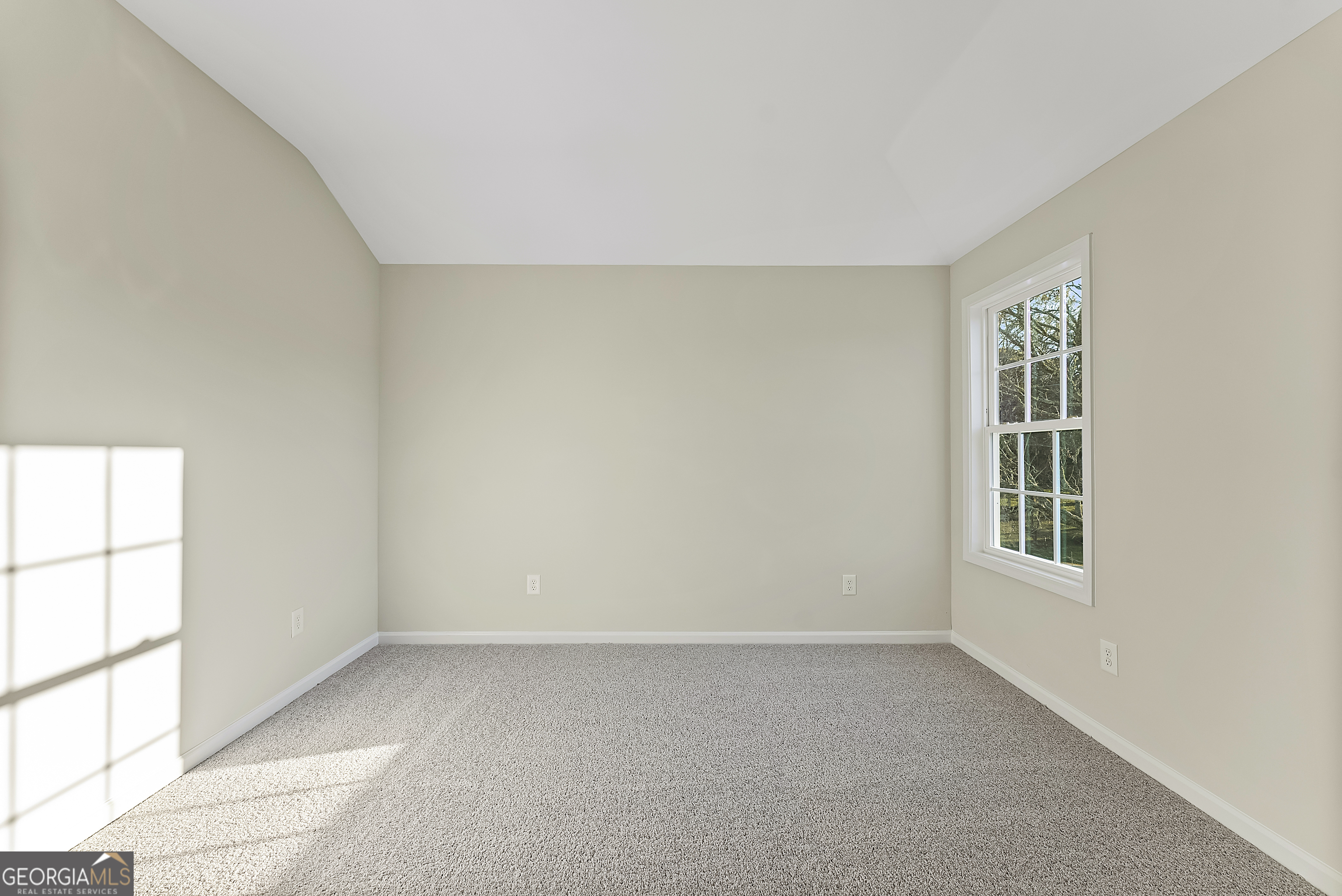 575 Mountain View Drive, Unit 17B Hamilton, GA 31811 - Photo 23 of 34 an empty room with windows