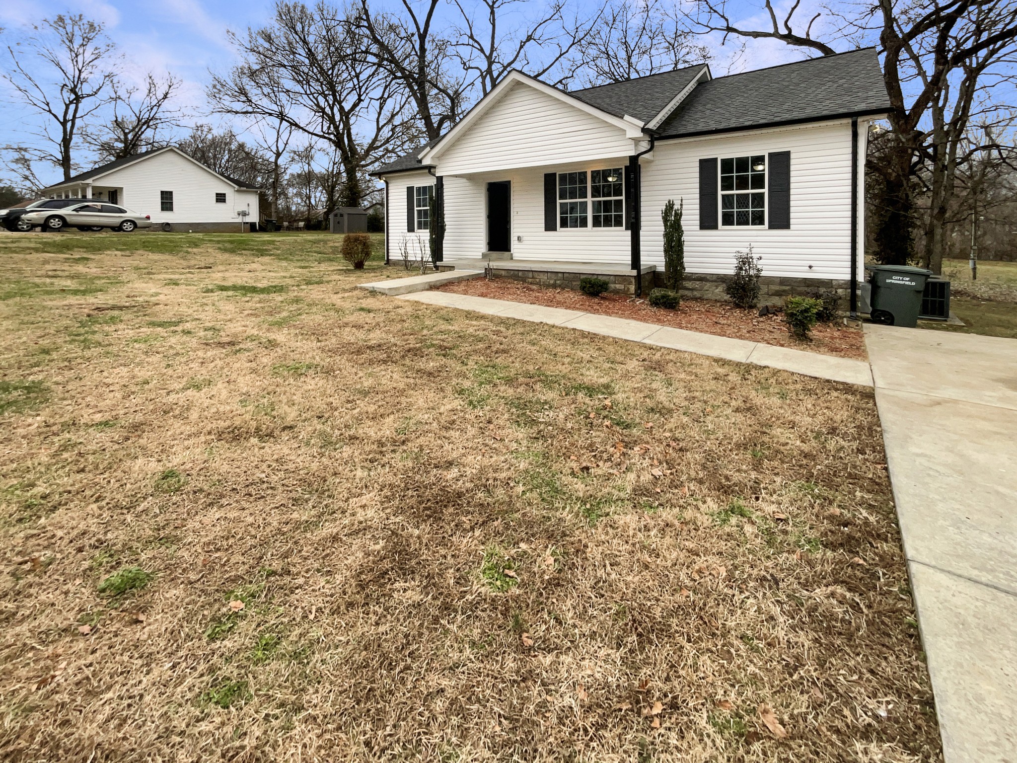 817 North Brown Street Springfield, TN 37172 - Photo 7 of 20 a front view of a house with a yard covered in snow