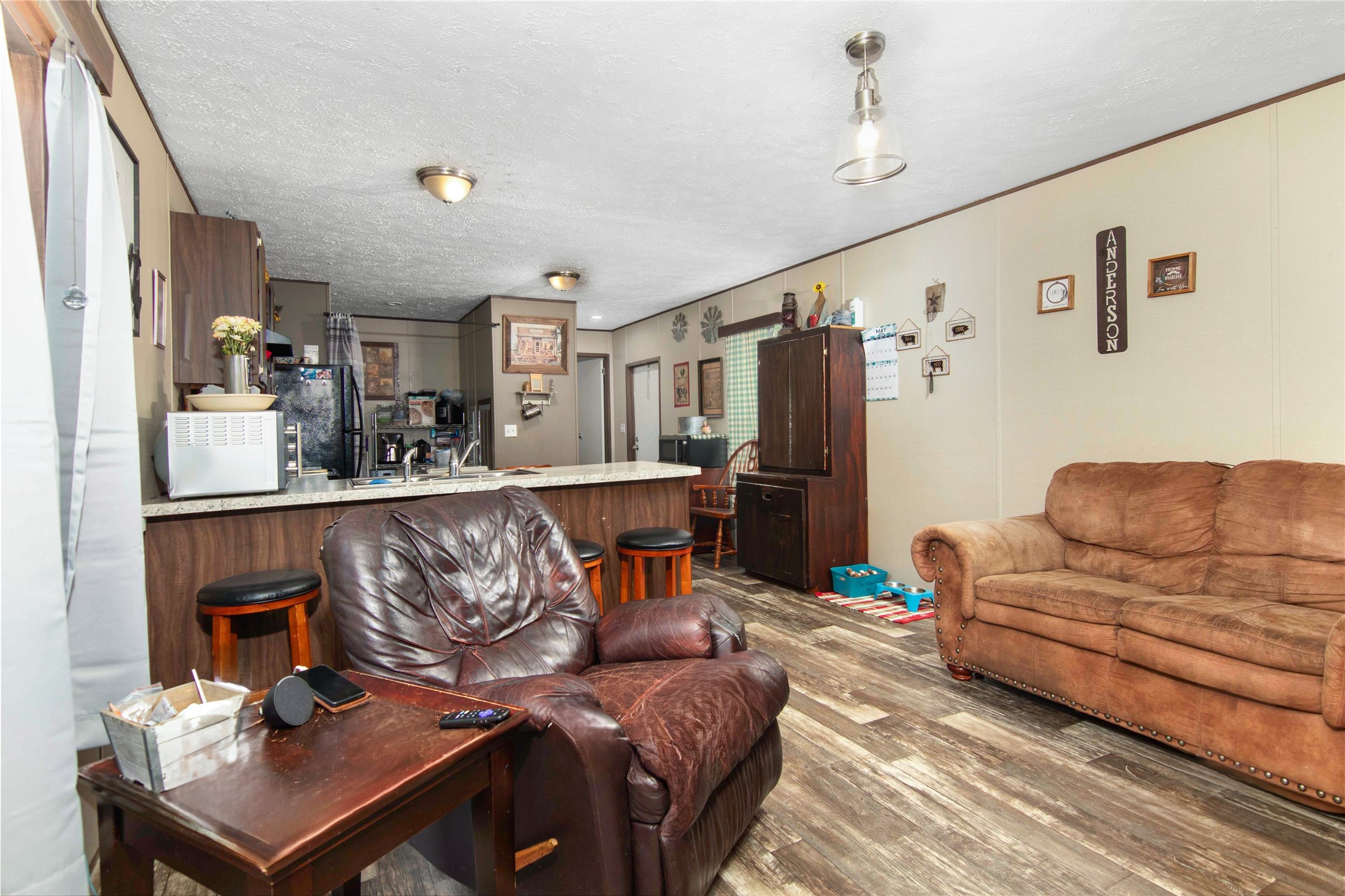 18093 Pickering Road Conroe, TX 77302 - Photo 8 of 29 a living room with furniture and a table