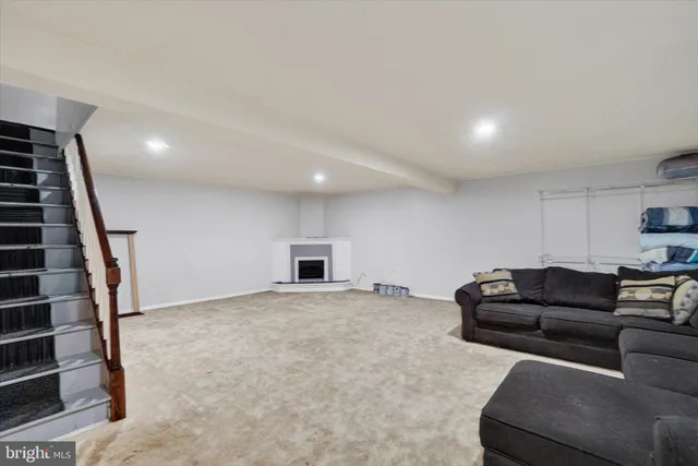 a living room with furniture and a couch