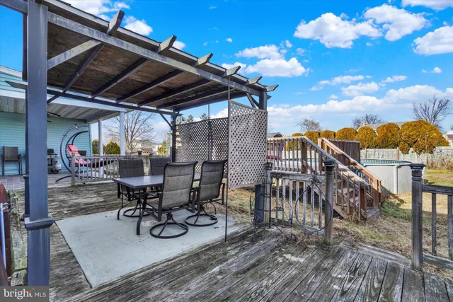 a view of a yard with large trees