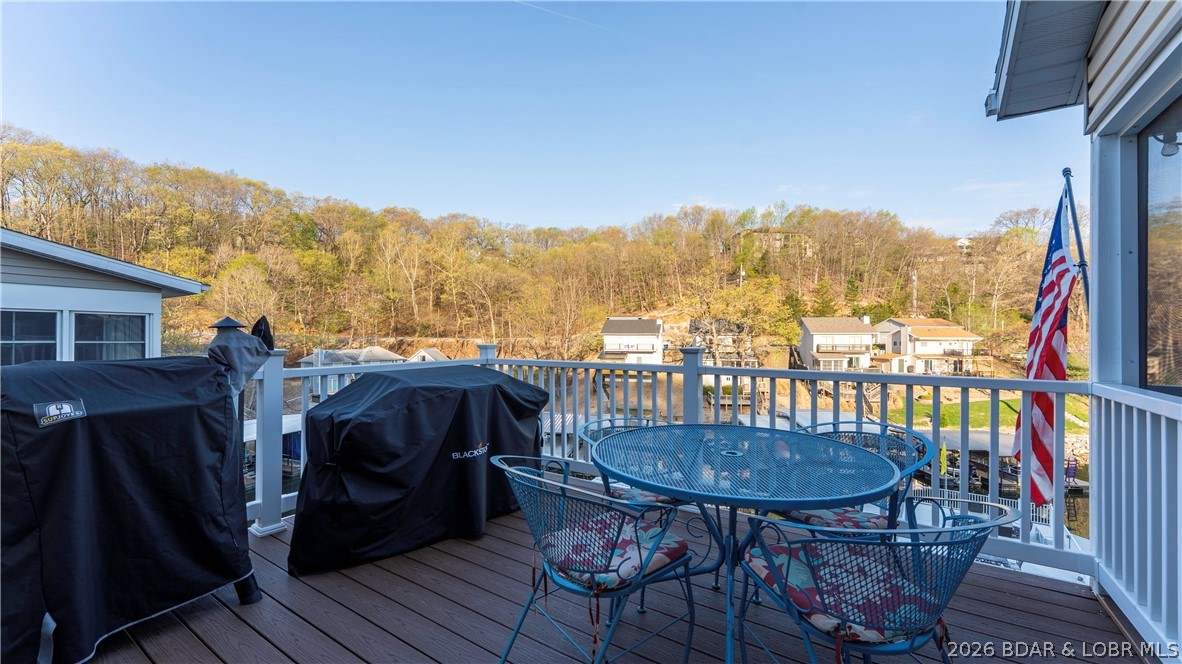 1453 Ginger Road Lake Ozark, MO 65049 - Photo 13 of 46 Outdoor grilling and dining is a breeze off your m